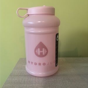Hydrojug 73 oz bottle with flip straw. New. Pink